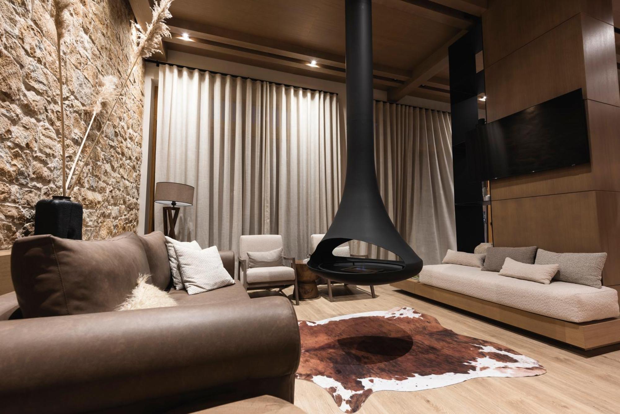Revi Mountain Resort Boutique Hotel กาลาวริตา ภายนอก รูปภาพ